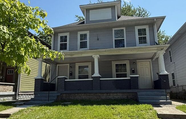 Completely Renovated 3BR/1BA Townhome located near Downtown Indy.