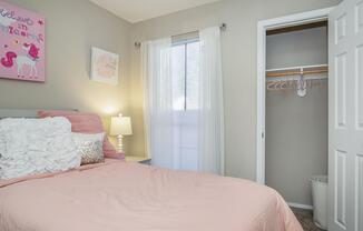 a bedroom with a bed in a hotel room