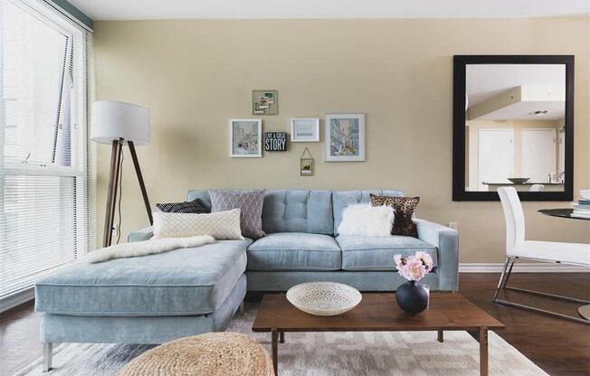 Living Room with large sofa at Wilshire Vermont, Los Angeles, CA 90010