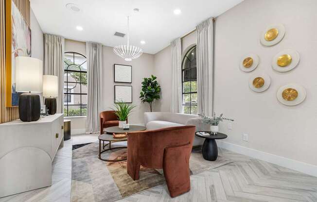 A living room with a brown sofa and a white couch.