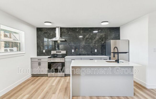 1314 S QUINCY AVE