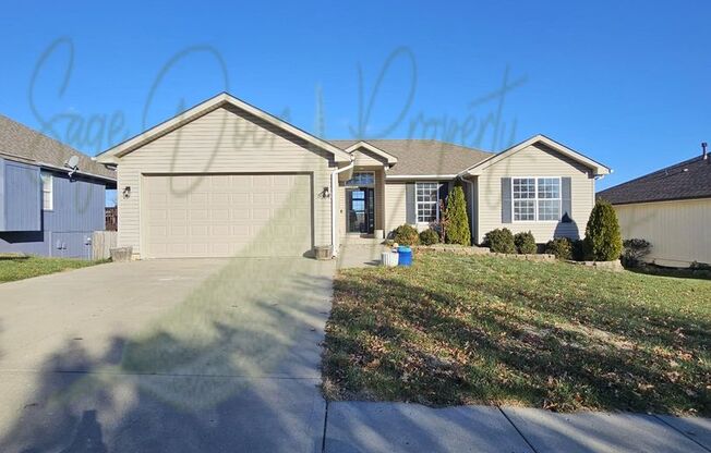 STUNNING GRAIN VALLEY HOME!!!