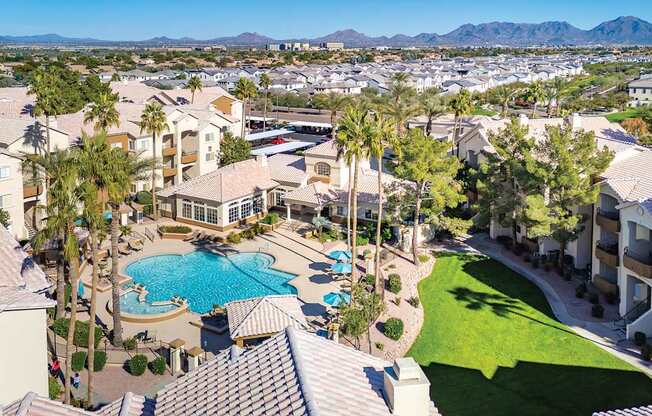 Aerial picture of property including resort-style swimming pool and buildings - Sonterra Apartments at Paradise Valley