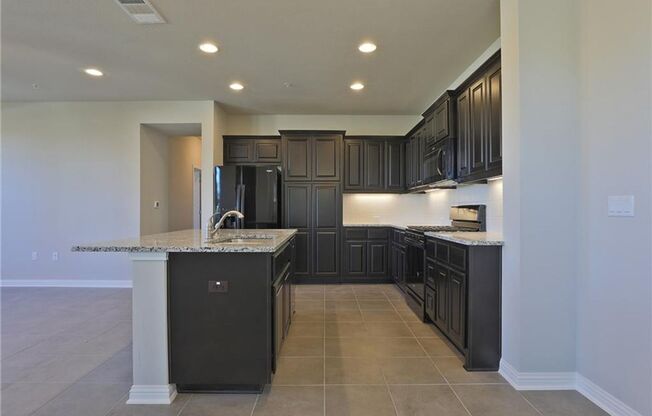 Spacious 4-Bedroom Home in Gated Lakeline Center Community!