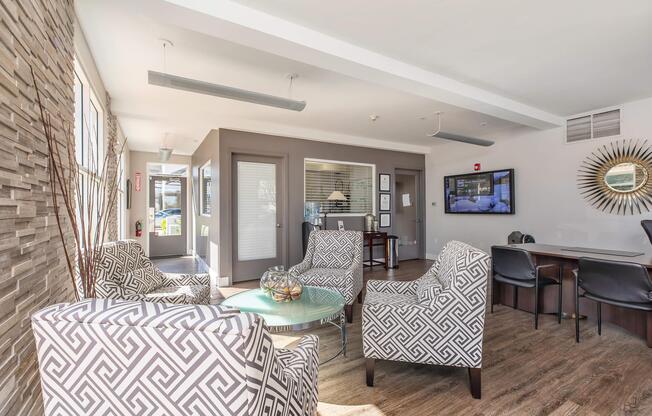 a living room filled with furniture and a fireplace