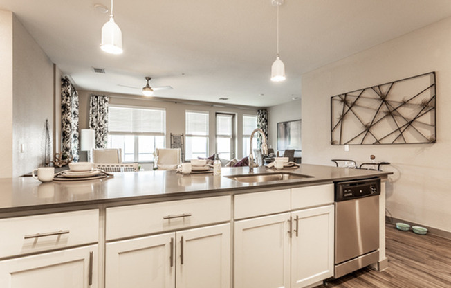 furnished living area with breakfast bar in apartment home