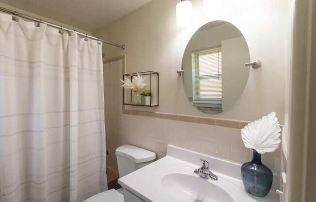 This is a photo of the bathroom in a 560 square foot, 1 bedroom, 1 bath apartment at Aspen Village Apartments in Cincinnati, OH.