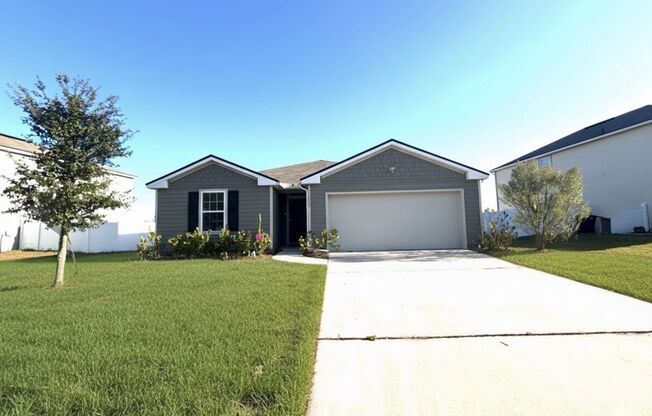 Beautiful 4 Bed 3 Bath Home. Move-In Ready with Amenities. Double Garage. Peaceful Water View! Washer Dryer Included!