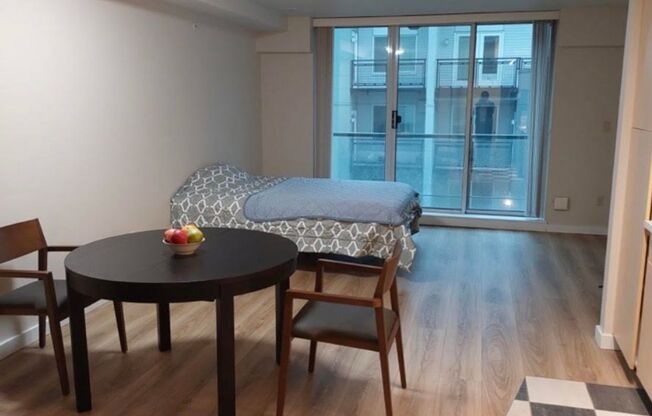 Downtown Bellevue Studio with Balcony, In-Unit Laundry & Amenities