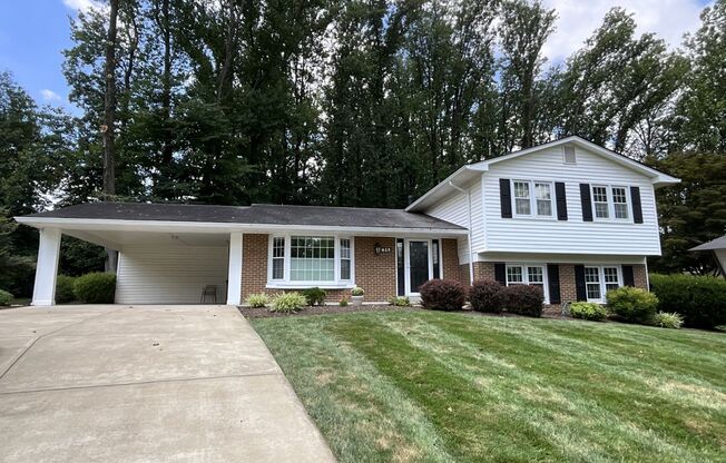 Handsome 5 Bedroom, 2.5 Bath , 4-level Brick Split Level Home Nestled Comfortably in Beautiful Pickett Estates