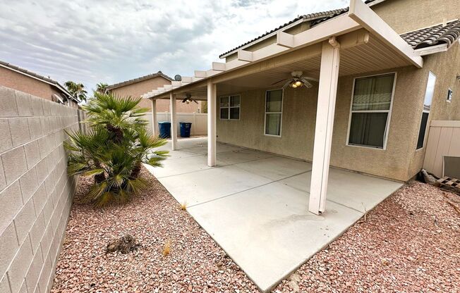 Perfect family home in the gated Cactus Springs community with the master bedroom & bath on the first floor!