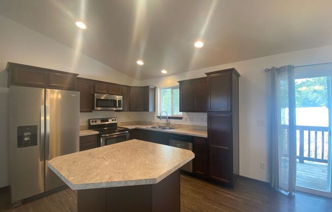 4 bedrooms 3 baths-Mead School District House with attached two car garage