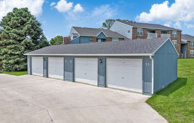 A two-car garage is attached to a house.
