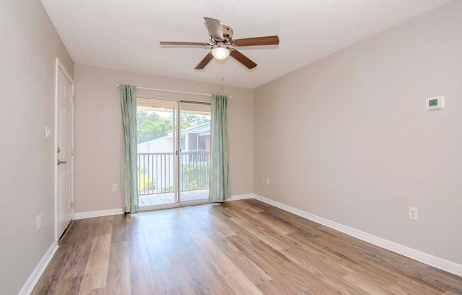 1 Bedroom/1 Bath with a Den/Office Area- Screened Lanai- Water Views-Corner Unit- No Upstairs Neighbors!!