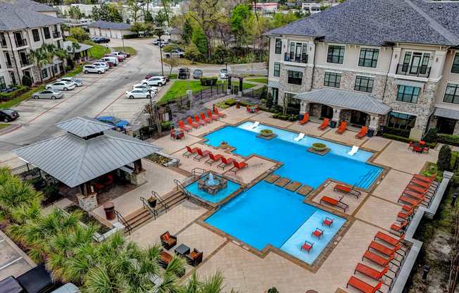 an aerial view of the resort style pool at the estates at spring valley