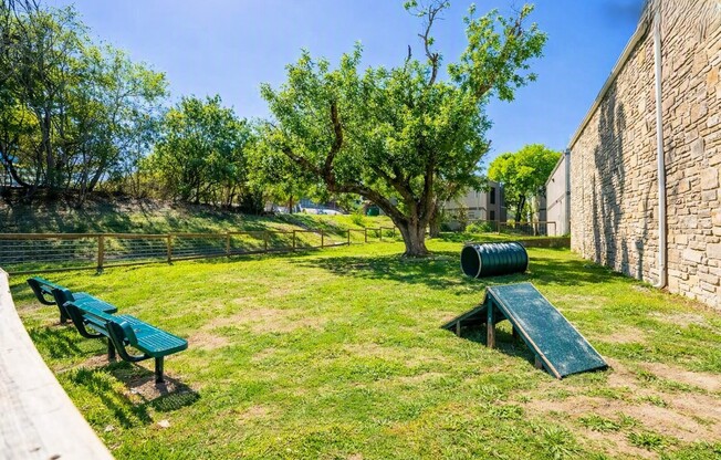 Embrace outdoor living at The Riley Apartments! Enjoy a spacious dog park and well-maintained green spaces, perfect for relaxation and recreation. Your ideal home awaits—explore your new lifestyle today!