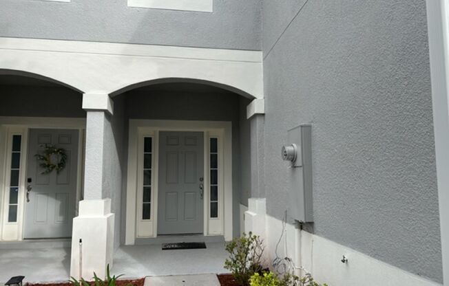 MOVE IN NOW! Beautiful 3 bed 2.5 bath townhome with large screened in back porch & 1 car attached garage!! In man gated Spring Isle/Avalon Park!!