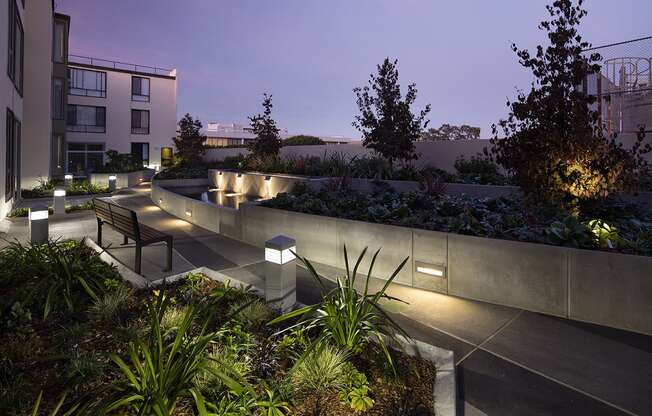 Inner courtyard with a water feature and sitting area.