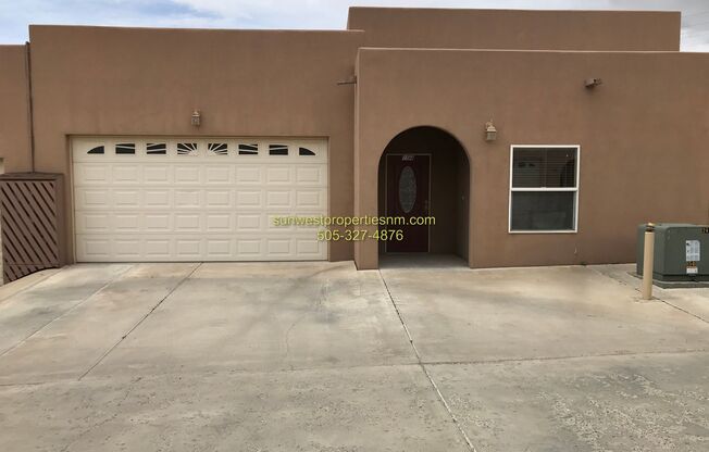 3 Bedroom, 2 Bathroom Condo with 2 Car Garage and Fenced back yard