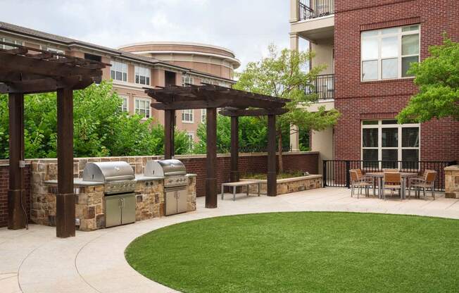 grill area with pergola and seating
