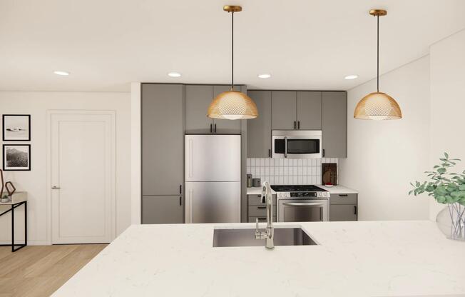 Gather with ease in Modera Bridle Trail's gourmet kitchens, featuring expansive islands, sleek cabinetry, and stainless-steel appliances.