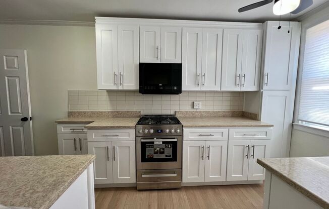 Newly Renovated 3-Bedroom Townhome with Finished Basement! Available NOW!