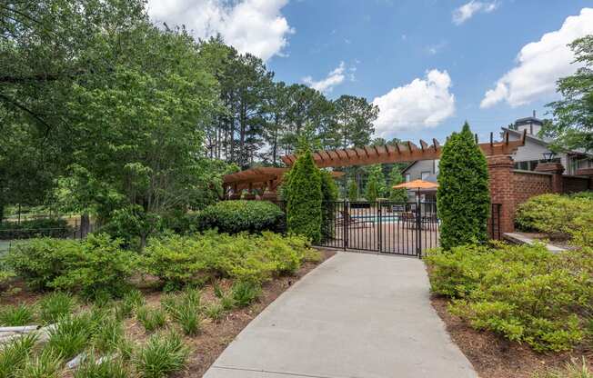 the preserve at ballantyne commons apartments walkway to pool and gated patio