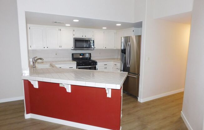 Gorgeous 3 bedroom condo with a 2 car garage! Tons of upgrades*Southwest*Gated community*