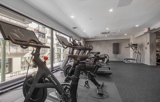 Gym with cardio equipment l Rasa Apartments in Oakland CA