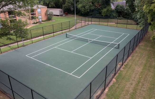 an aerial view of a tennis court