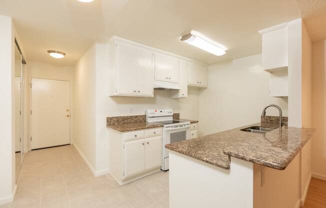 Kitchen with White Appliances and White Cabinets