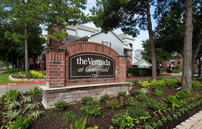 the sign for the apartments at Veranda at Centerfield, Houston