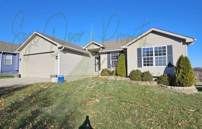 STUNNING GRAIN VALLEY HOME!!!