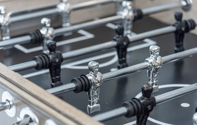 a close up of a glass table top with chess pieces