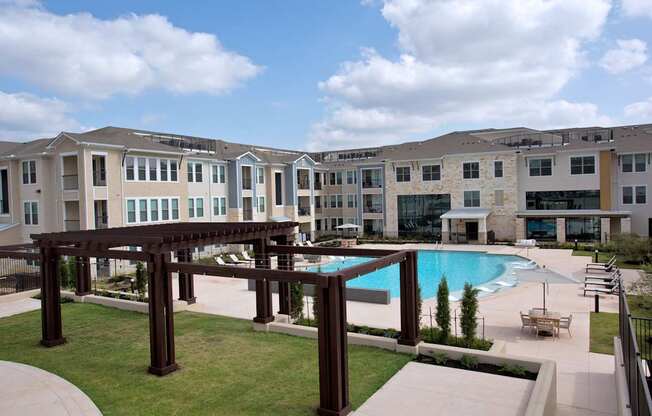 Swimming Pool With Lounge Chairs at Edge and Stone, San Antonio, TX, Texas, 78260