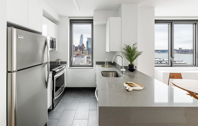 Large 2 bedroom apartment with open kitchen and dining space overlooking Hudson Yards