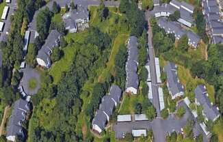 an aerial view of a neighborhood with houses and trees at Murrayhill Park, Beaverton, 97008