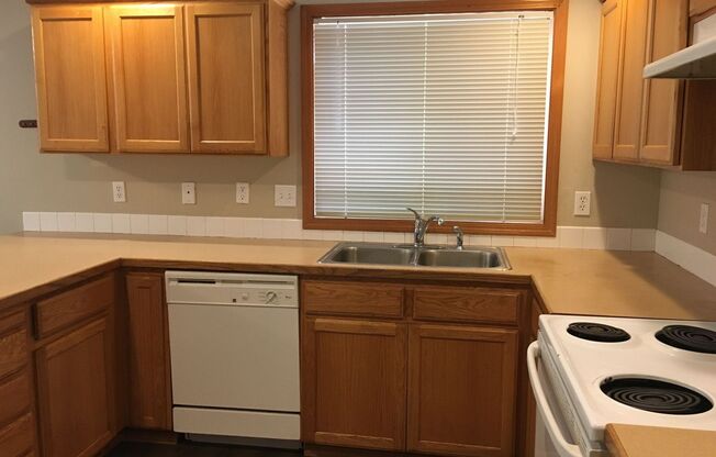 Spacious 4-Bedroom Home with Classic Charm & Tranquil Patio Retreat
