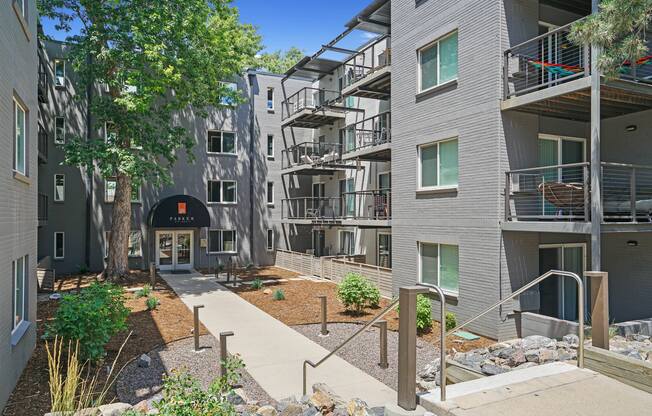 parker off pearl walkway with stairs and a courtyard