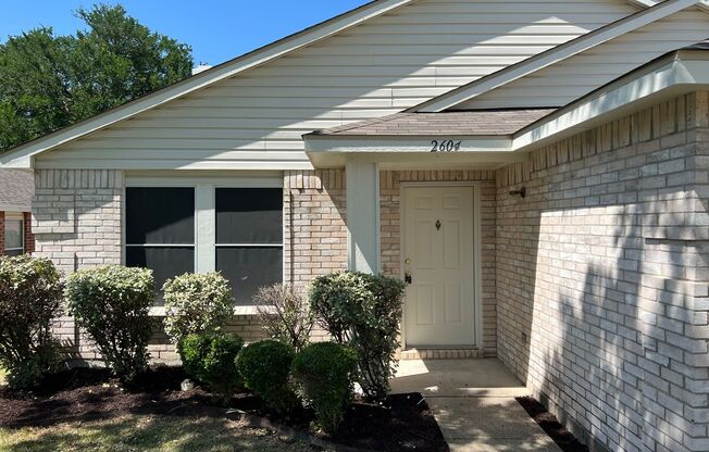 Happy home with a spacious floor plan that backs up to a greenbelt!