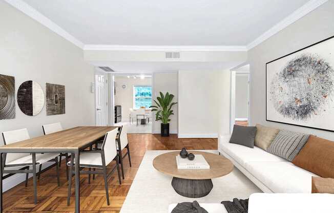A modern living room with a dining table and a couch.