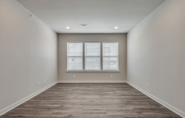 Spacious Living Room with Overhead Lighting