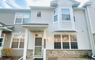 Fantastic two-story townhome w/ open concept in desirable Bailey's Arbour!