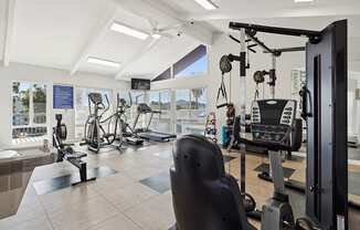 Community Fitness Center with Equipment at Colonnade at Fletcher Hills Apartments in El Cajon, CA.
