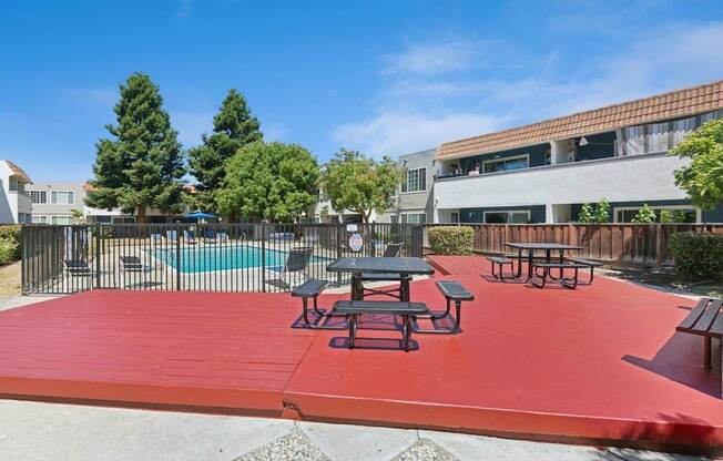 Picnic tables and a pool.