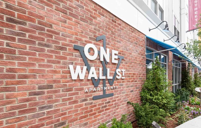 View of the One Wall St logo around the main entrance