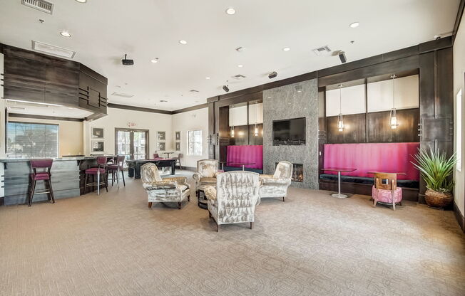 a living room with couches and chairs and a kitchen with a television at Adiamo Palm Valley, Arizona