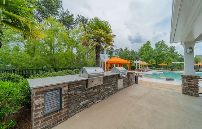 the preserve at ballantyne commons concierge desk and pool area with trees
