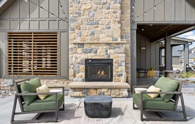 a living room with couches and a fireplace