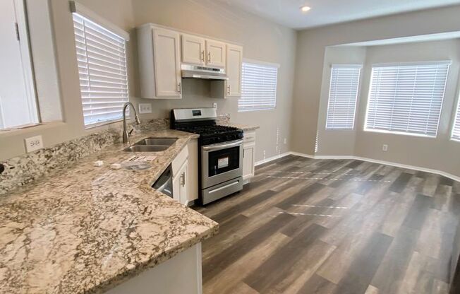 Beautiful 2 story home on a corner lot with many upgrades such as two-tone paint, luxury vinyl flooring, stainless steel appliances, and 2 Built-in desks great for working from home or distance learning! It also comes with a large backyard and a balcony!
